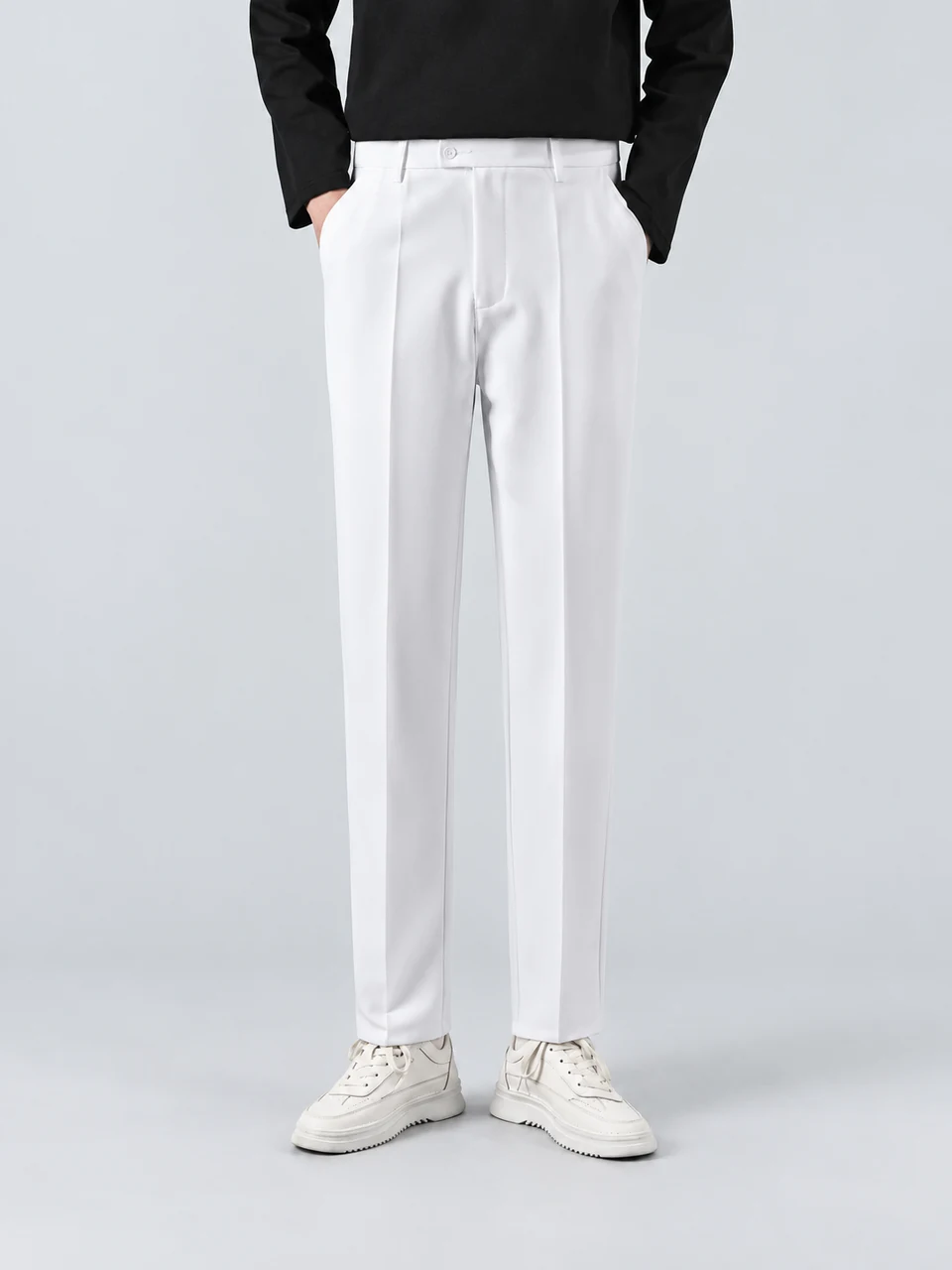Theo Trousers — White — Product photograph